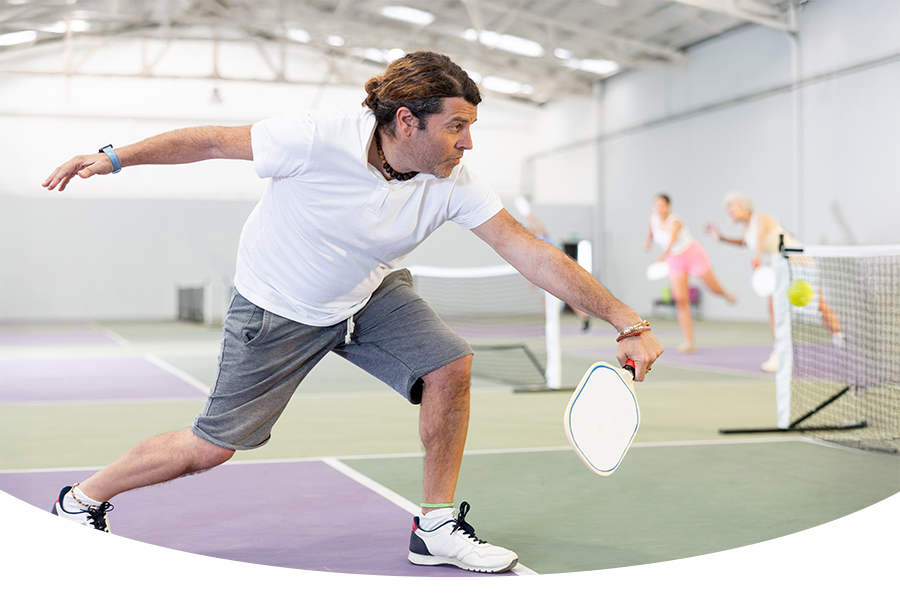 Adult Male Playing Pickleball