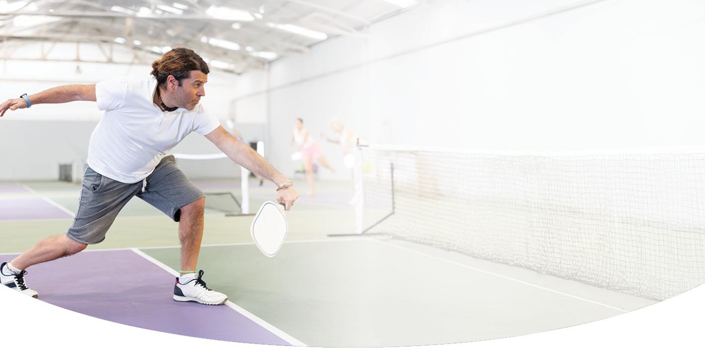 Adult Male Playing Pickleball