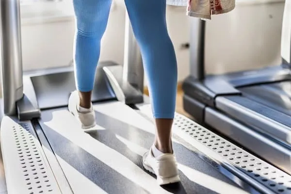 woman walking on a treadmill